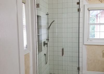 zero clearance shower and hexagon floor tile installed during bathroom renovation by regional renovations